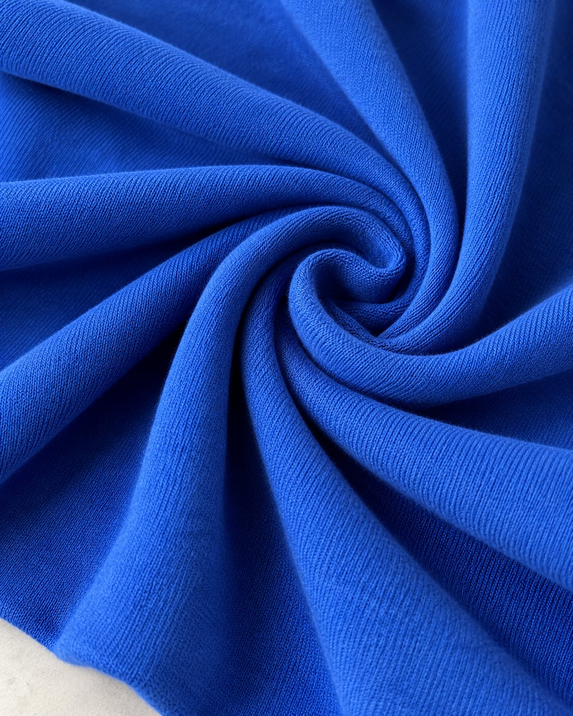 Macro em espiral da Malha Suedine Pima na cor azul royal